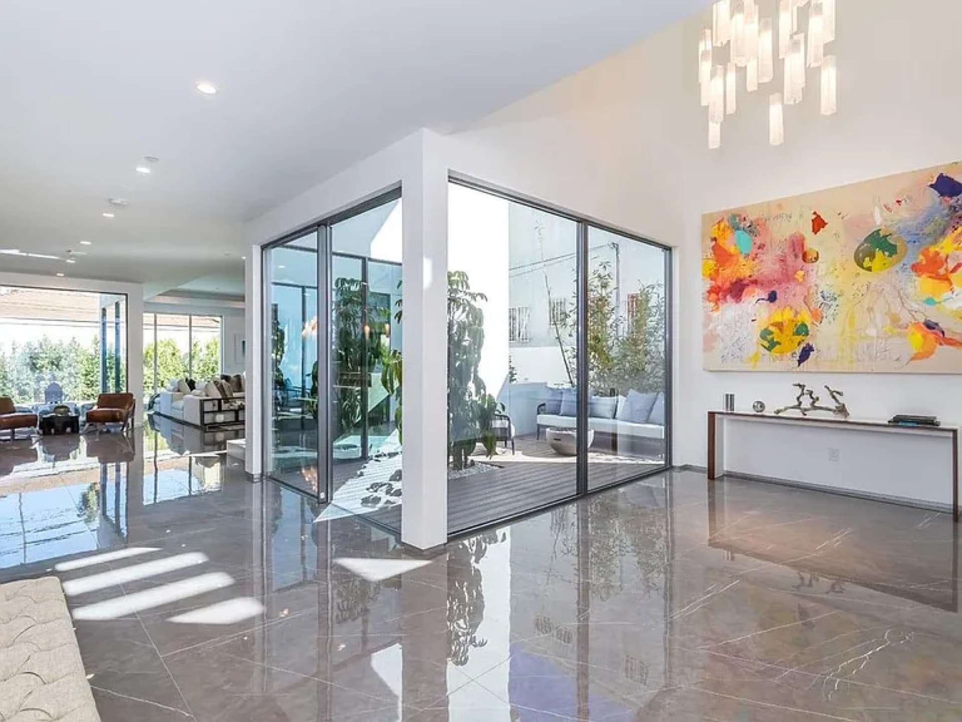 Interior with full-height glazing on both sides — Formosa Residence